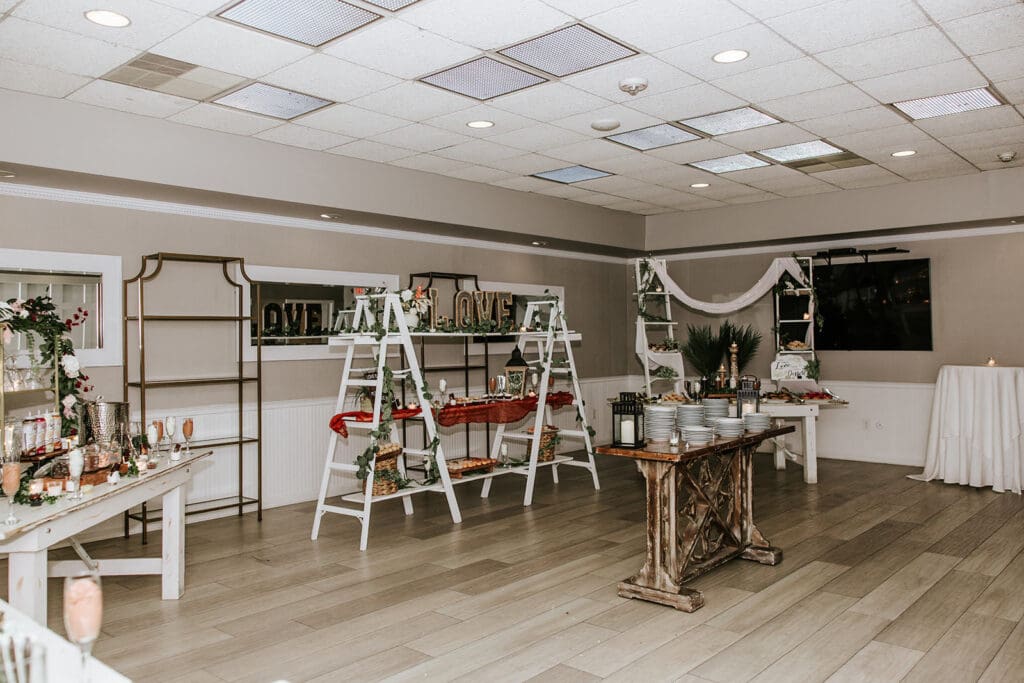 Ramblewood Country Club’s signature Chocolate Room wedding dessert display with styled shelves, sweets, and grazing options.