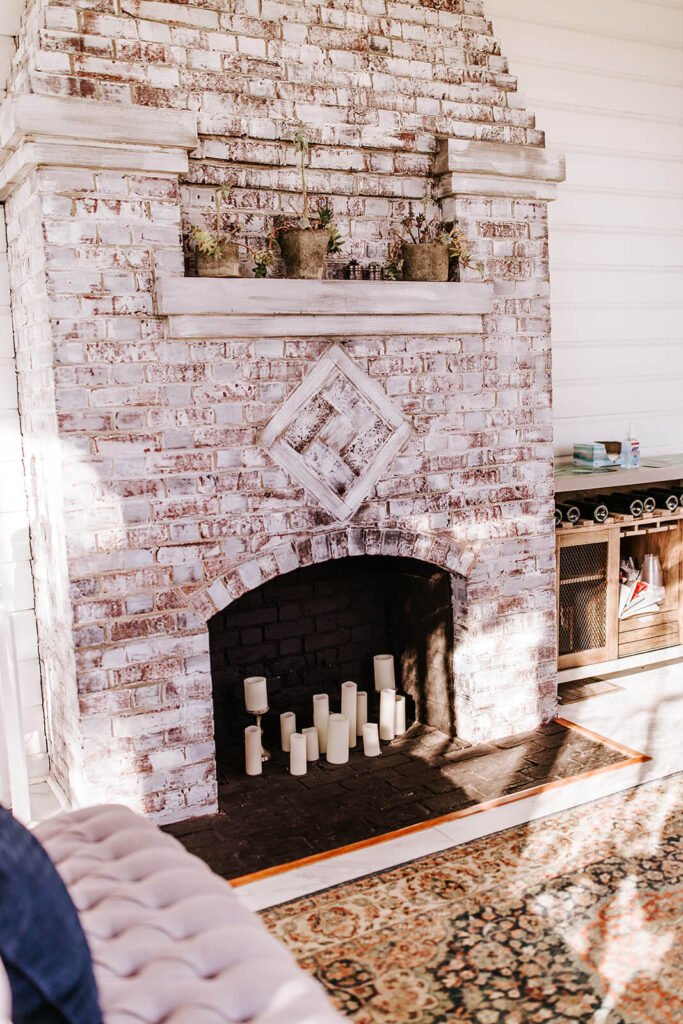White brick fireplace inside the getting ready suite at Collingswood Grand Ballroom