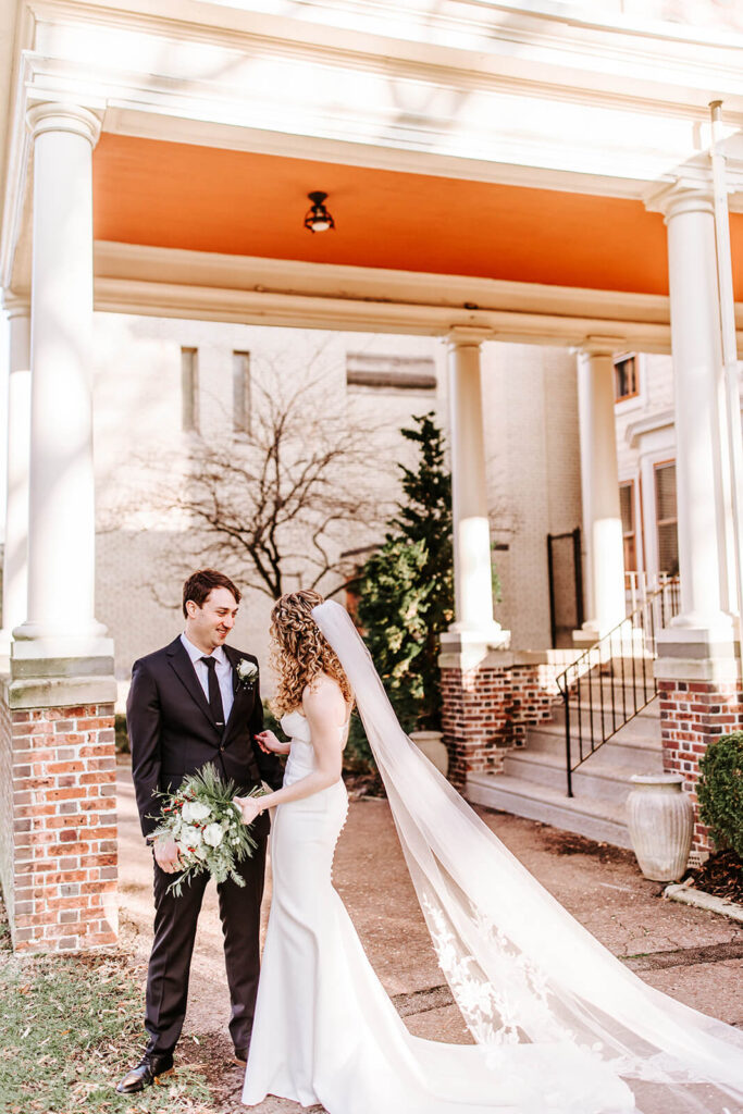Bride and groom portrait on the front porch of Collingswood Grand Ballroom