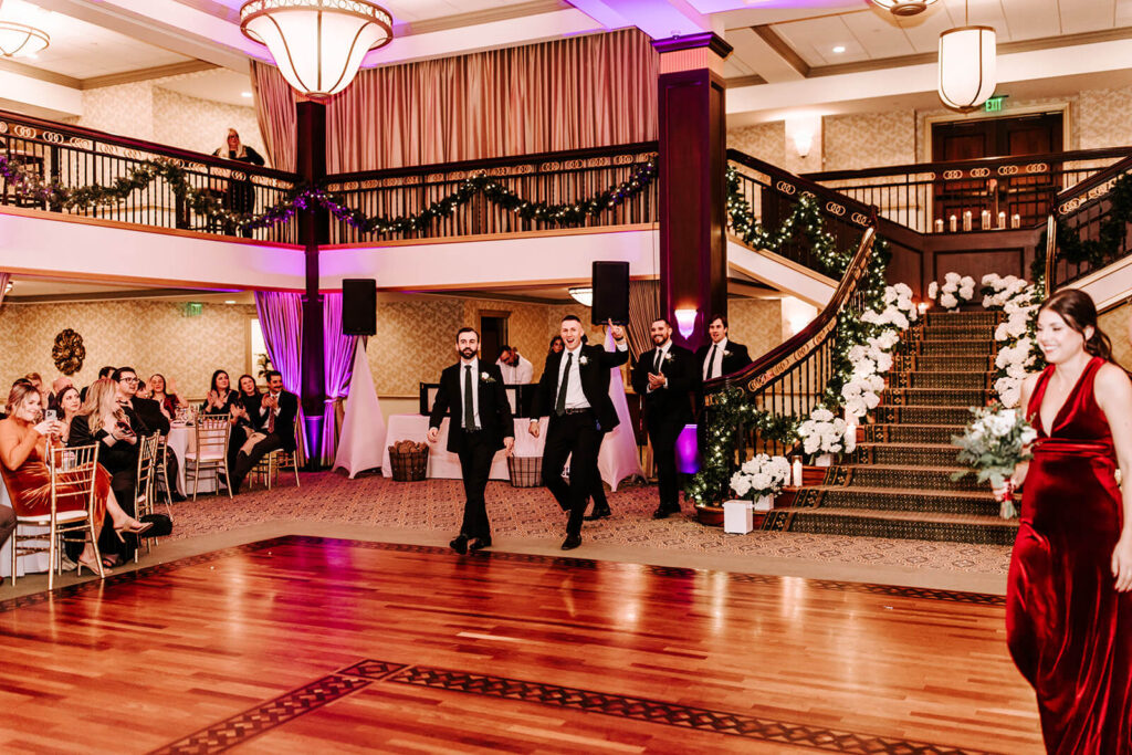 Wedding grand entrance inside the Collingswood Grand Ballroom reception space